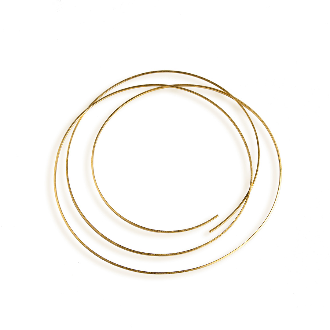 M I N I M A L I S T  - neck piece
<a href="/goldsmithsfair/">Goldsmiths' Fair</a> - this week till sunday 

three minimalist strands of gold dancing elegantly around the neck - I have fallen in love with this piece. happy if it finds a new home during the fair but also very happy if I get to wear it a little lo