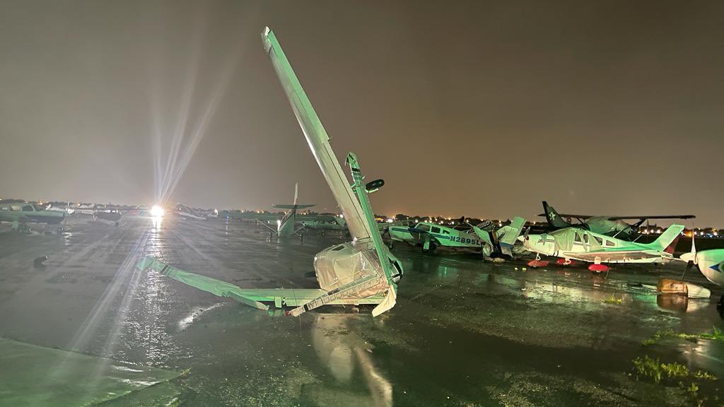 Breaking: Photos coming in from North Perry Airport in Hollywood, where a possible Tornado touched down. <a href="/NWSMiami/">NWS Miami</a>