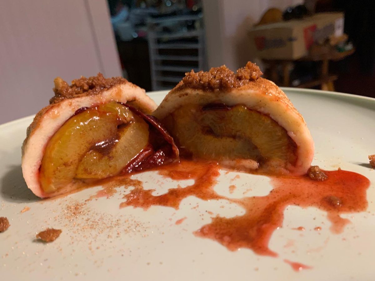 RoseCollette's tweet photo. Knedle ze śliwkami [or szilvás gombóc (Hungarian)] completed! Really good. I used two different types of plums in these plum dumplings, and I prefer the Italian plums in this. Topped with cinnamon sugar and sautéed breadcrumbs! 😋 https://t.co/3FMUDourL3