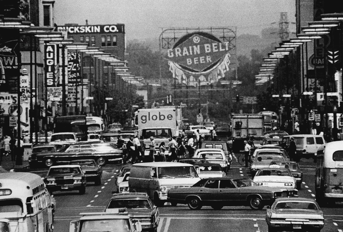 The Grain Belt Beer sign towers over traffic on Hennepin Ave. in Minneapolis, August 1971. (<a href="/StarTribune/">The Minnesota Star Tribune</a> File Photo)