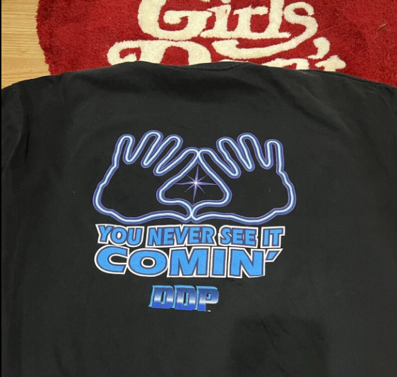 WCWTFPodcast's tweet photo. #WCWWorstMerch @WWE @RealDDP 

Sometimes the presentation of these shirts on eBay is even better than the shirt itself... https://t.co/2zb3IbGi5h