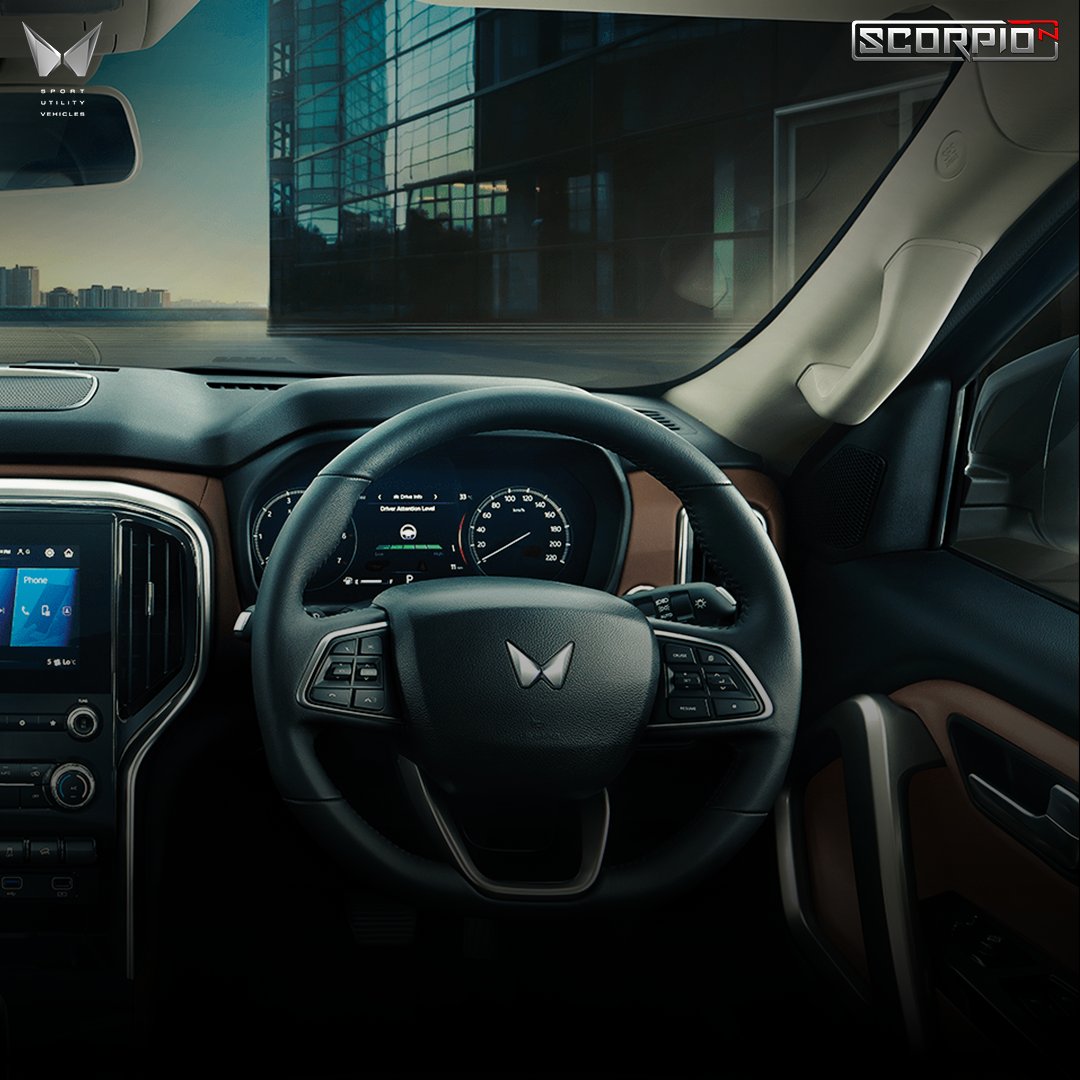 MahindraScorpio's tweet photo. Commanding presence with sophisticated essence. Conquer the city roads while sitting in a comfortable cabin made with rich coffee leatherette interiors of the All-New Scorpio-N.

#AllNewScorpioN https://t.co/0mc7YFq4ic