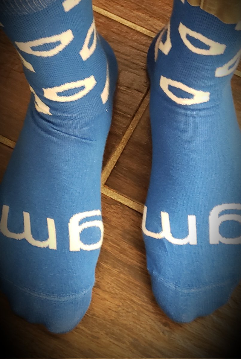 DigitalFarmland's tweet photo. Dressing for the occasion with my new #Chainlink socks. #SmartCon2022 https://t.co/dzm9jN6Uhc