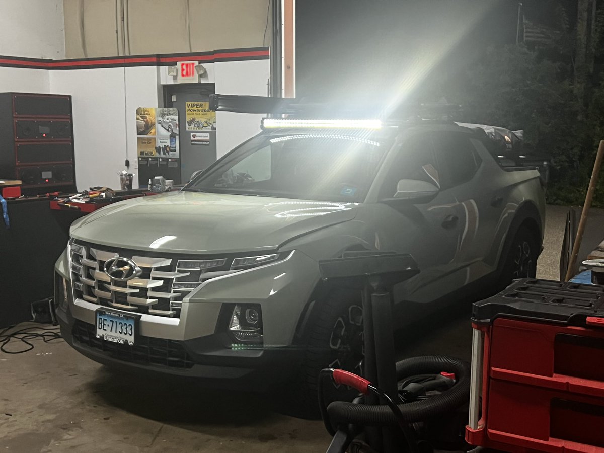 12v_Ike's tweet photo. @Hyundai  #SantaCruz light bar setup coming soon.  Seen here on our shop 2022 Sage Grey Santa Cruz. Featuring our No-Drill mounting solution, means no holes in the roof. #heiseled #lightbar #overlanding #hyundai #assctllc https://t.co/jaboc1e6gc
