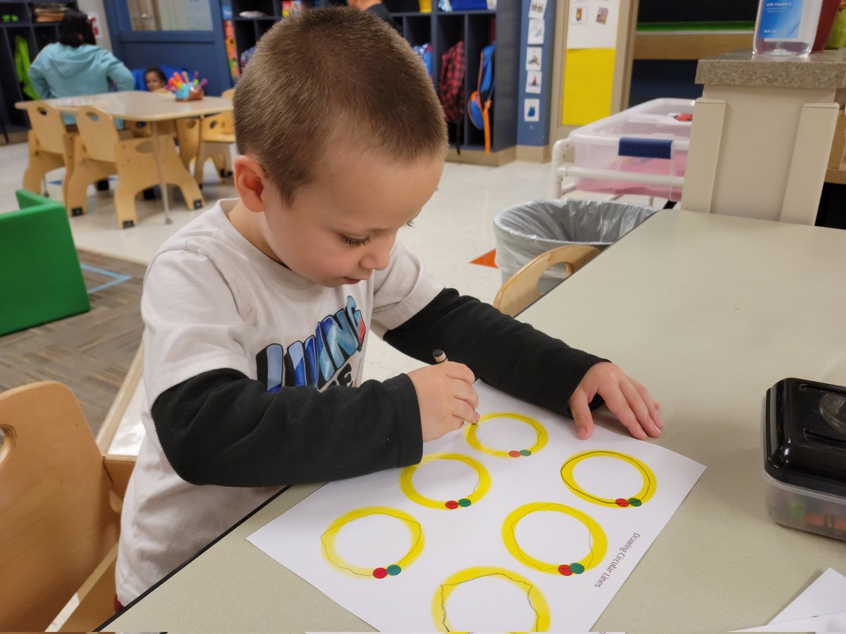 One of our small groups this week is practicing tracing circles, lines, or the first letter of our name (depending on where each student is at developmentally).