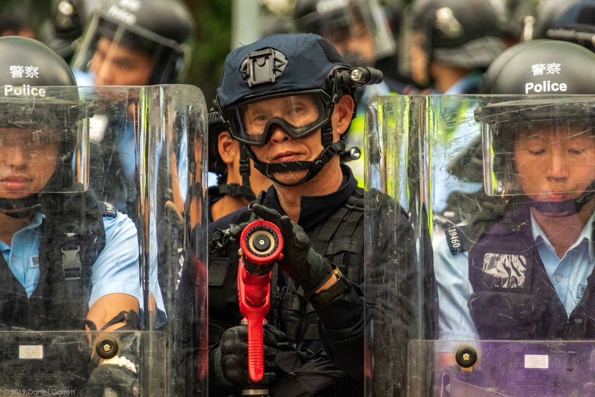 DanGarrett97's tweet photo. Two photos of mine, one from #928 2014, &amp; #612 2019. Both in Admiralty. The face of the #HKSAR #CCP #Chinazi #communist #PoliceState hasn't changed. It has only gotten worse since the #NSL. #HongKong is no longer #Asia's #WorldCity.
#Umbrella #WaterRevolution #FreeHK #LiberateHK https://t.co/Zp7Dg5HnL9
