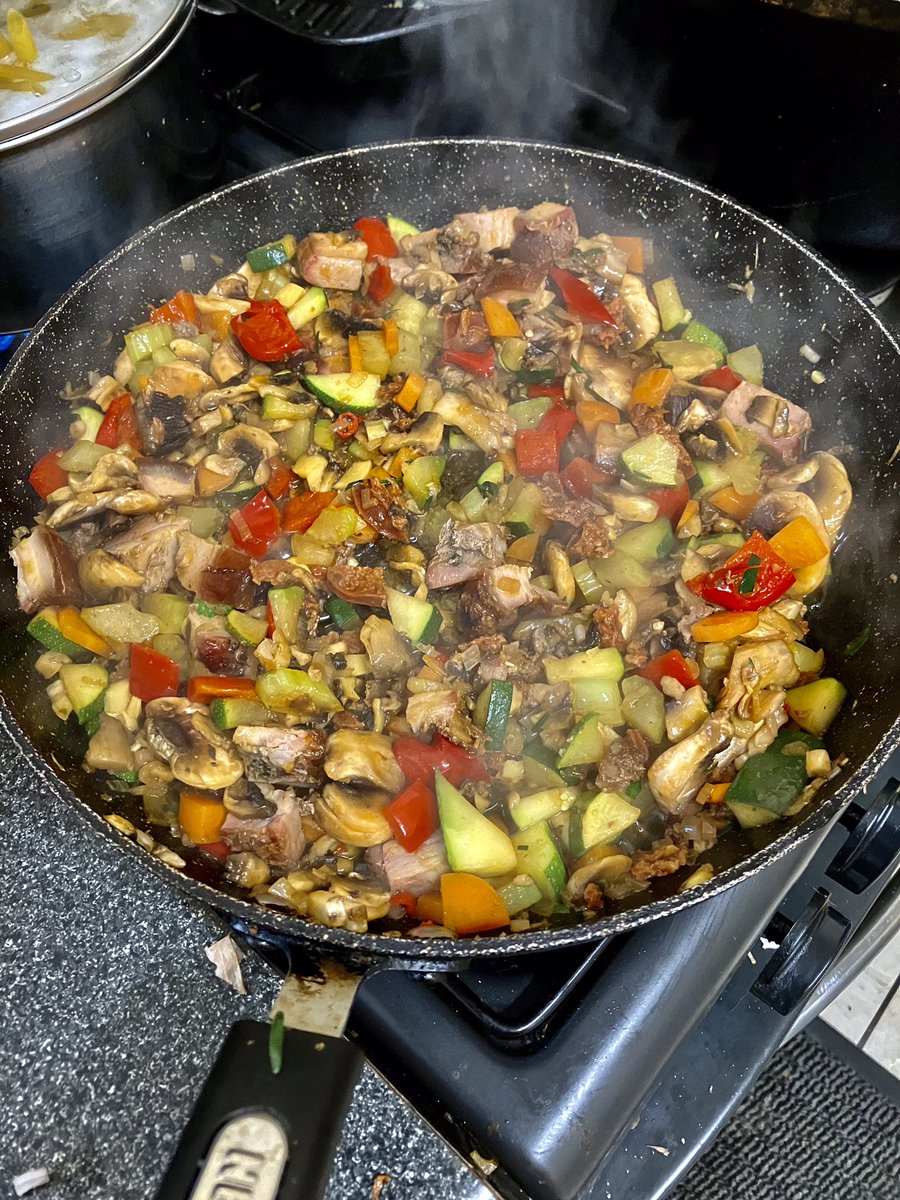 Fridge raid.Shallots, red pepper,leftover Porchetta cut into cubes, tomato sauce I made from the garden,courgette from the garden, garlic,mushrooms,and chilli from the garden.Boiled up some pasta and chucked it all together with some spring onions and Parmesan cheese.#nofoodwaste