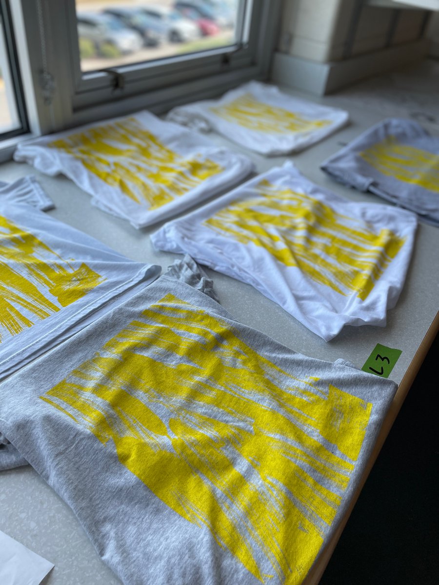 Advanced Art students at @BrickellAcademy screen printing artist shirts for LOVE IS HARD WORK at the @ChryslerMuseum #vbcps #arteducation #sistercoritakent #chryslermuseum #yellow #screenprinting