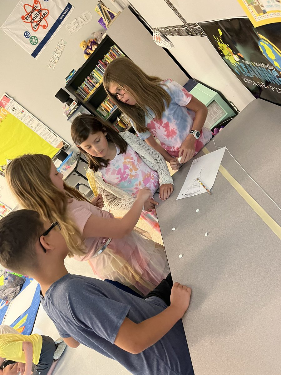 MsEsClassroom's tweet photo. My amazing group of kiddos this year. First week of school #stem and team building activities. How tall can you make a tower of spaghetti and marshmallows 🤣 @PortersNeck #fourthgrade #sciencerocks https://t.co/REBONUmyf3