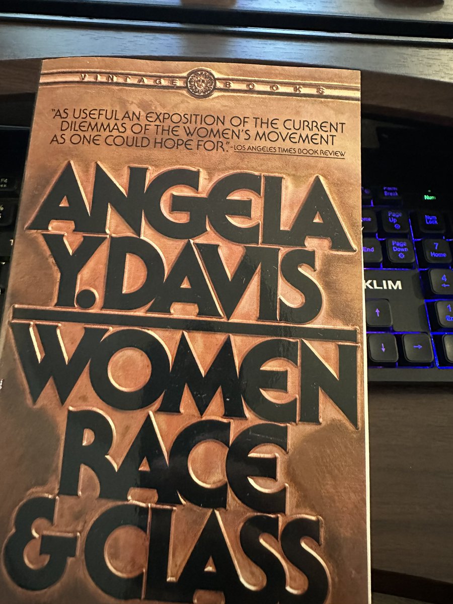 OpalEllyse's tweet photo. This is one of the books I keep behind me in my backdrop for virtual meetings and presentations. Had to pull it out as Angela Davis has taken us to church at the #2022RJSummit 🙌🏽✨🔥🔥🧡 @YWCAMadison https://t.co/bBmoFO3Q4V