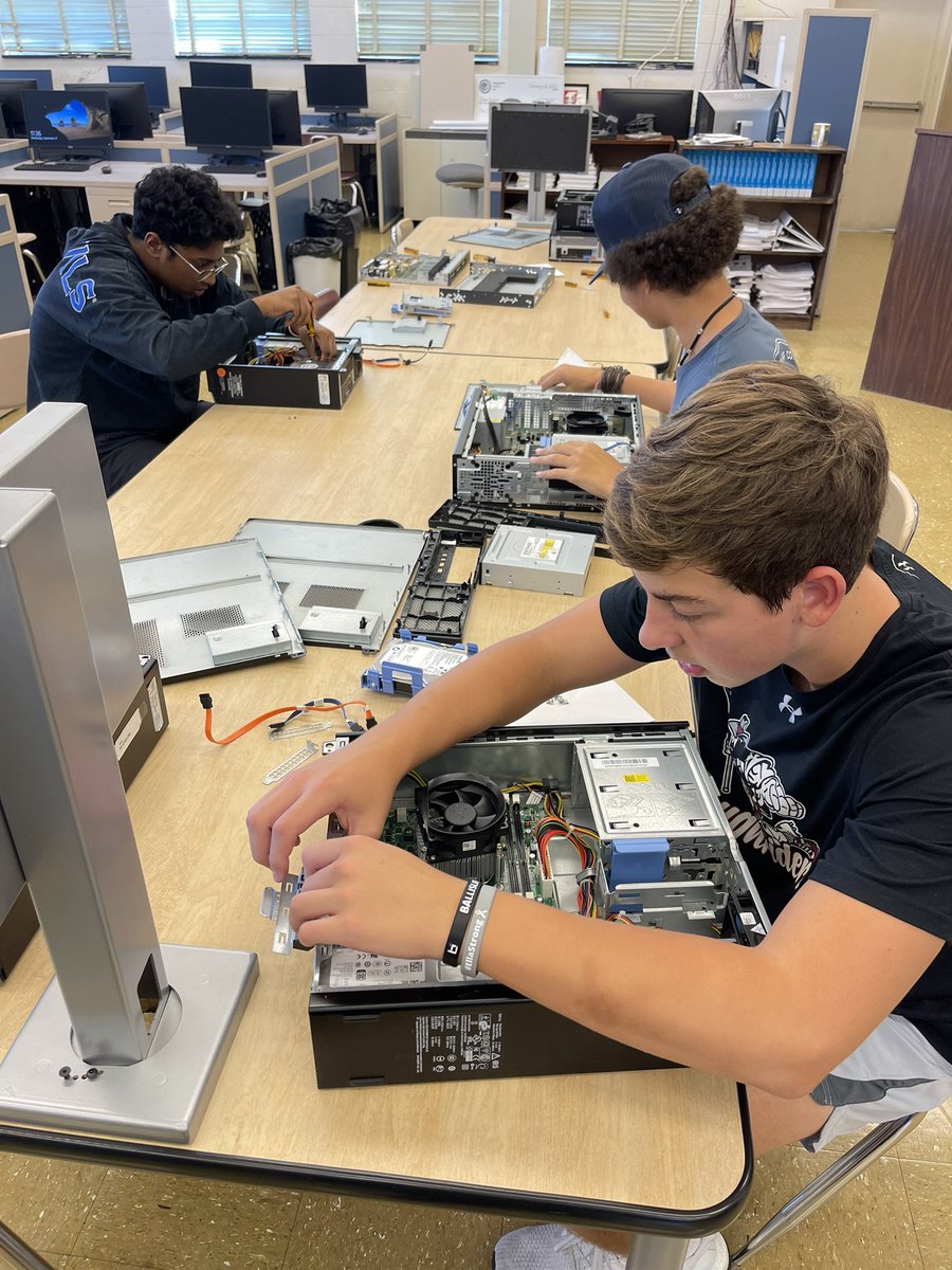 DHS_AOIT's tweet photo. DHS AOIT students rebuilding computers https://t.co/X03DgKmDFh