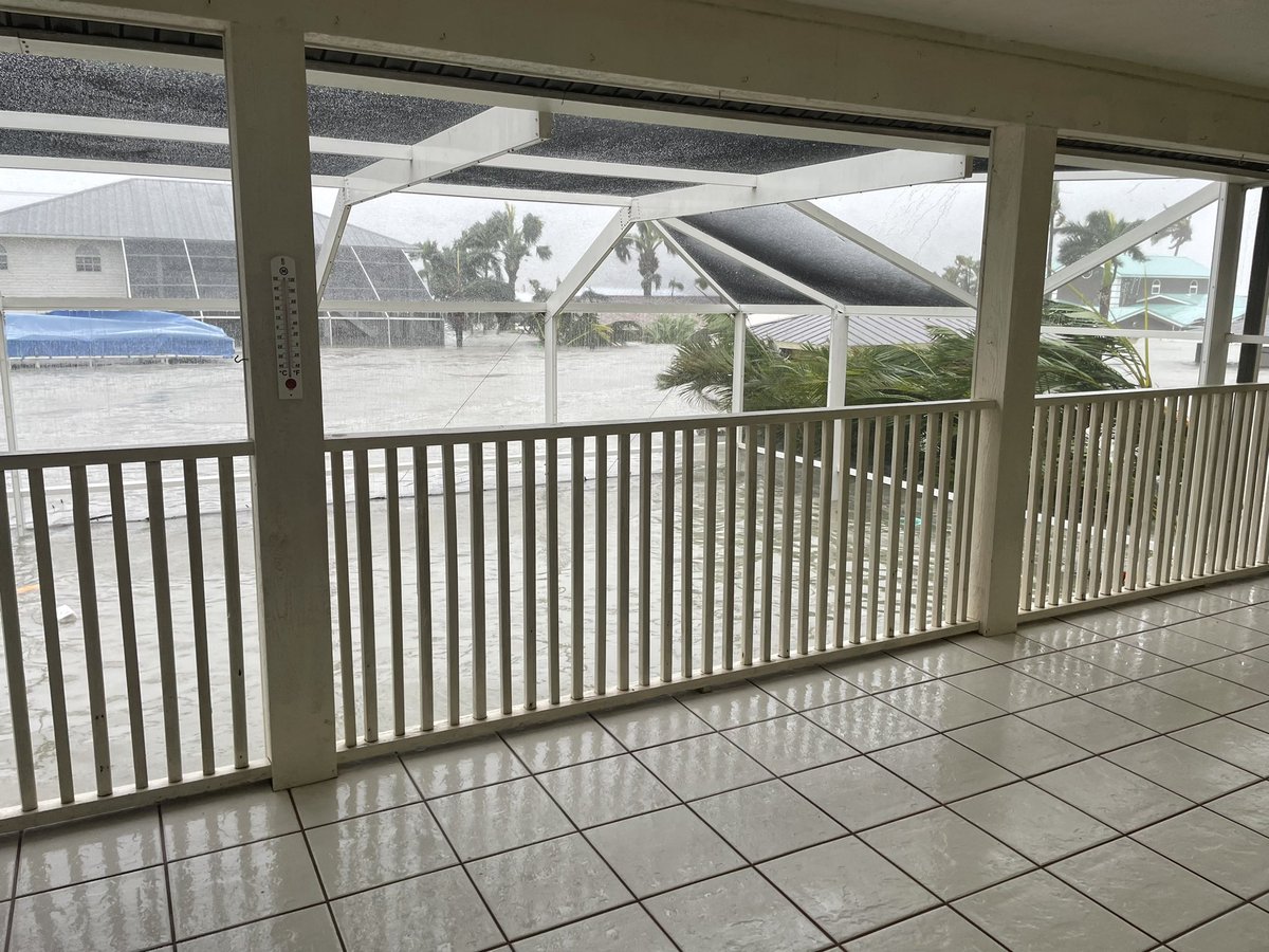 itsbethbooker's tweet image. Storm surge outside of my moms house on Fort Myers Beach.

I’m so sick.
