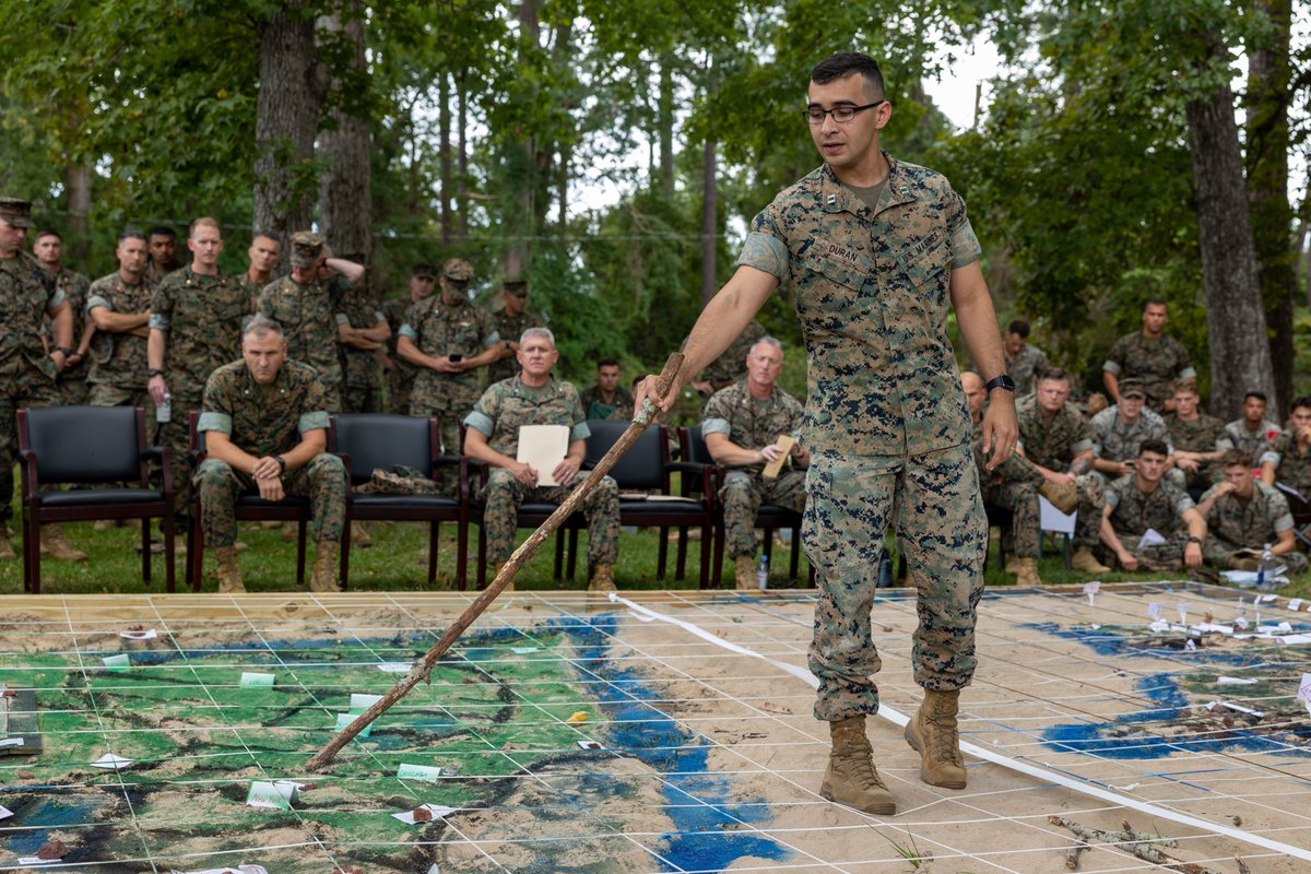 26MEU's tweet photo. Plan of Attack 🗺
@USMC leaders with @2dmardiv, brief Marines during a rehearsal of concept walk on @camp_lejeune. The ROC walk was conducted in order to establish clear objectives and communication between all personnel and their respective units in preparation for a #MCCRE. https://t.co/EAlcUvYXDx