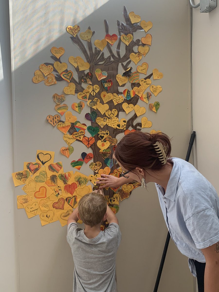 RoseComSchool's tweet photo. Here is our tree of 🧡‘s in progress. Each heart is a message of reconciliation, love and wishes for a better future.  Inspired by #WithOurOrangeHearts &amp; a window at @StKateriRegina 😀 https://t.co/7FA0r0Td6q