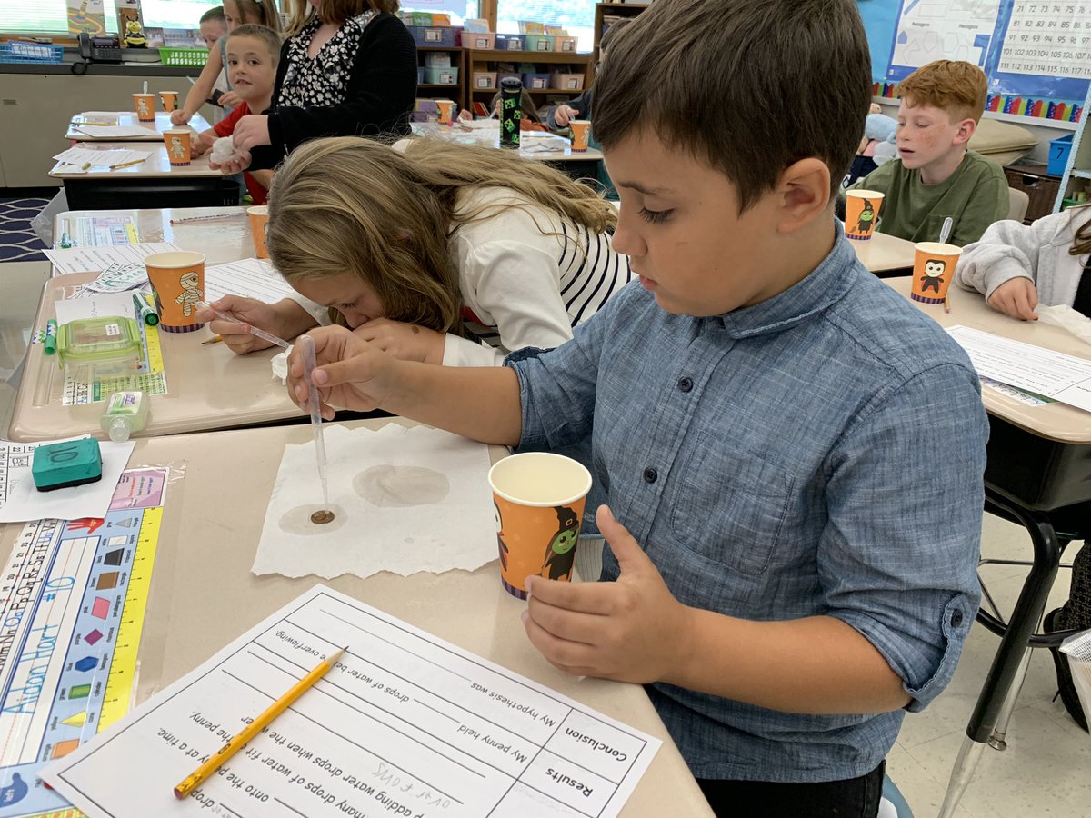 MrsSack_NC's tweet photo. Today we learned about the scientific method. We put it into practice by seeing how many drops of water can fit on a penny. Our hypotheses ranged from 1-12 drops. We were shocked to find a penny can hold about 23-27 drops of water.  @ojrsdnc @Ojrscience https://t.co/oaTrLUKIWt