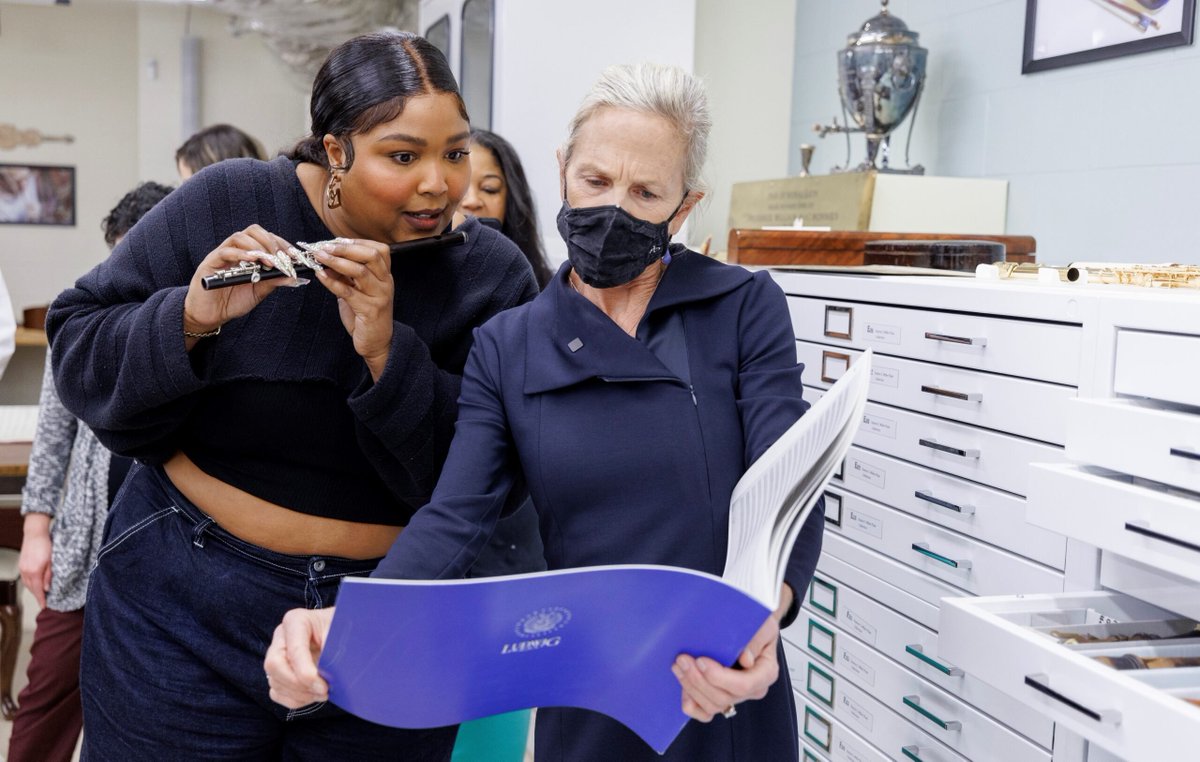 find yourself someone who looks at you the way Lizzo looks at flute sheet music at the Library of Congress