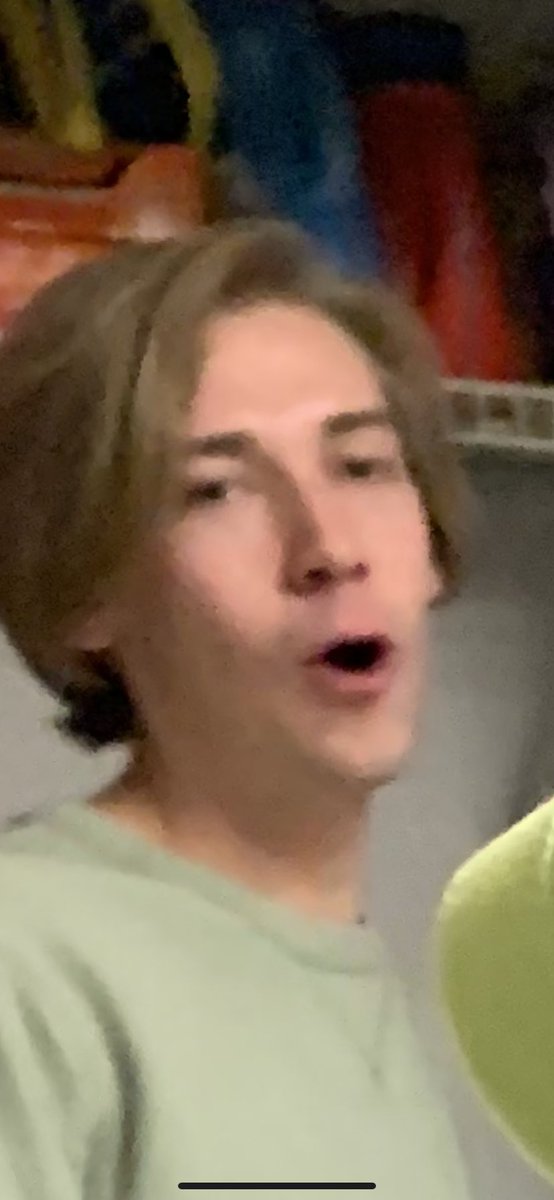 Kyle watching Lily eat a THICC tomato