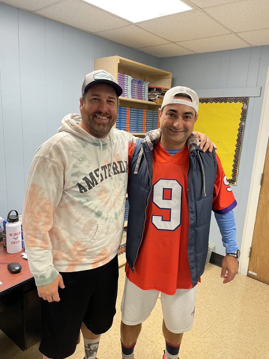 south_sidebus's tweet photo. Adam Sandler Day at South Side High School. Mr. English and his esteemed colleague from the History Dept, Mr. Colesanti (an honorary Business Department member and DECA chaperone extraordinaire) facing off in a who wore it better! #GameOnRVC https://t.co/4LAvka3at4