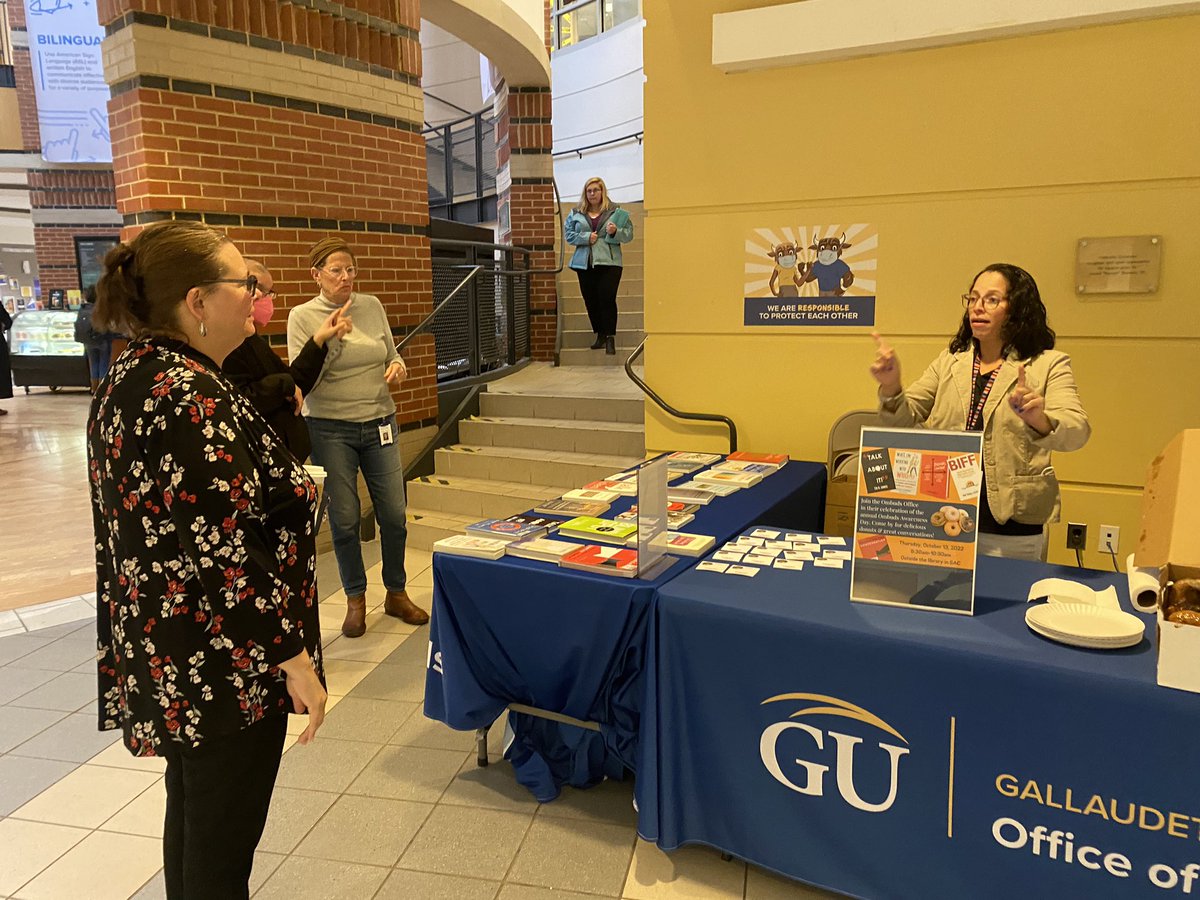 OmbudsGallaudet's tweet photo. So much fun hosting Ombuds Day event this am! Thank you, Gallaudet Library for providing  conflict resolution books so we could showcase for the community to see. And for making this event a success! Wonderful seeing many of you! @GallaudetU @IntlOmbudsAssoc #OmbudsDay https://t.co/BhQH5mvag7