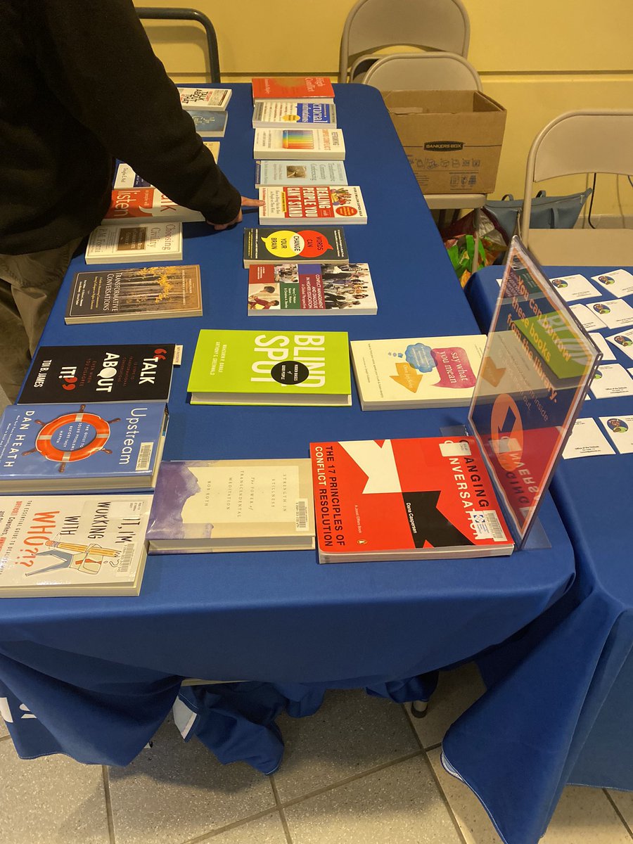 OmbudsGallaudet's tweet photo. So much fun hosting Ombuds Day event this am! Thank you, Gallaudet Library for providing  conflict resolution books so we could showcase for the community to see. And for making this event a success! Wonderful seeing many of you! @GallaudetU @IntlOmbudsAssoc #OmbudsDay https://t.co/BhQH5mvag7