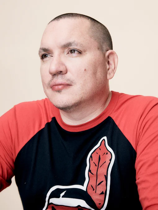 A portrait of director Jeff Barnaby looking off camera