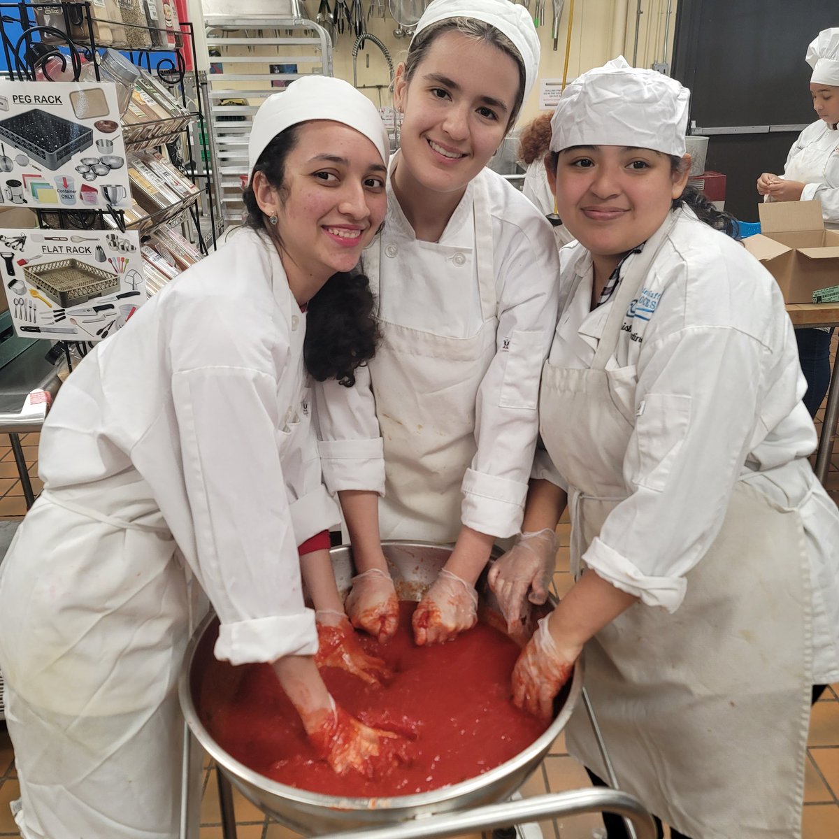 In preparation for the Autism Walk on campus tomorrow, my students were hard at work making pizza bagels- which included homemade sauce! These girls had the best time crushing whole peeled tomatoes by hand, just like they do in Italy! #proudteacher #chefsofthefuture