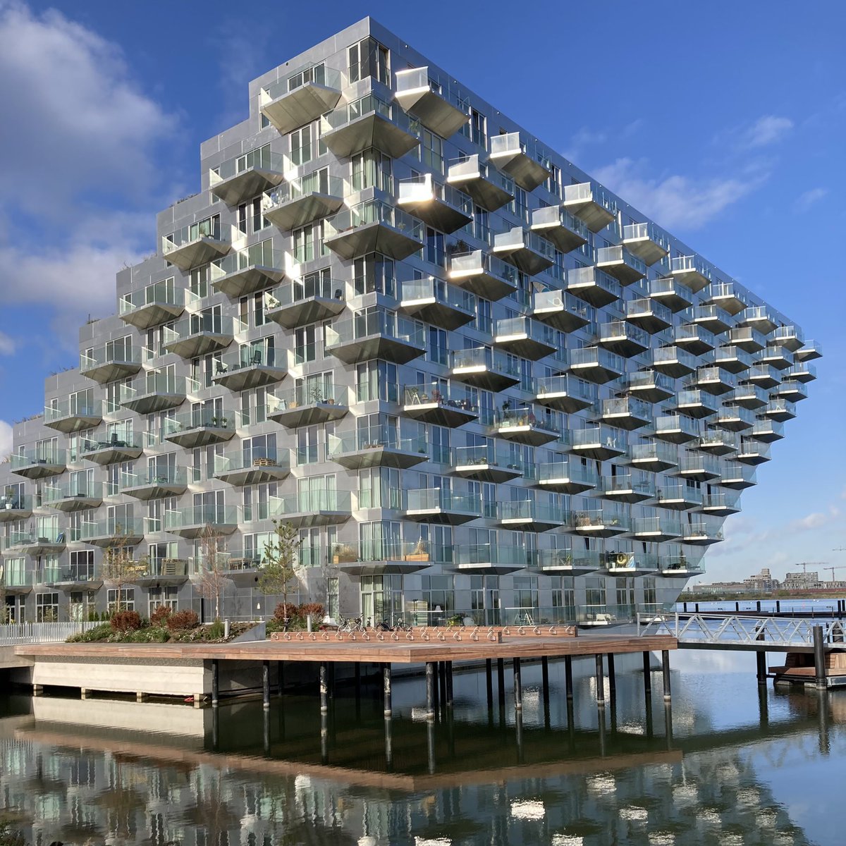 The very photogenic ‘poster child’ of the Dutch resi scene. Sluishuis in the IJburg district #Amsterdam <a href="/BjarkeIngels/">BjarkeIngels</a> <a href="/BARCODE_arch/">Barcode Architects</a>