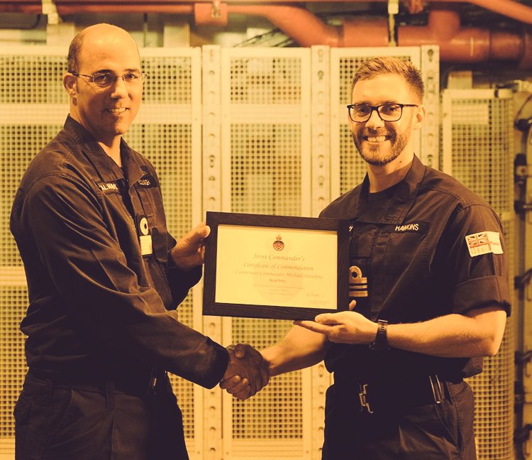 Thank you to @COMUKCSG for visiting us whilst at sea 🚁 And for presenting a Fleet EW Efficiency Award, a Long Service & Good Conduct medal, and a Joint Commander's Commendation.