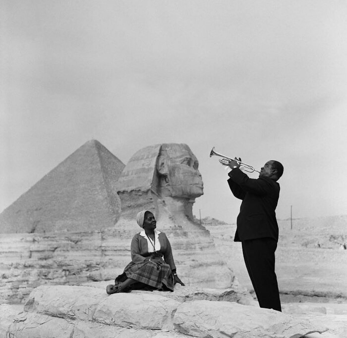 Louis Armstrong serenading his wife Lucille at the Great Sphinx of Giza, Egypt, 1961