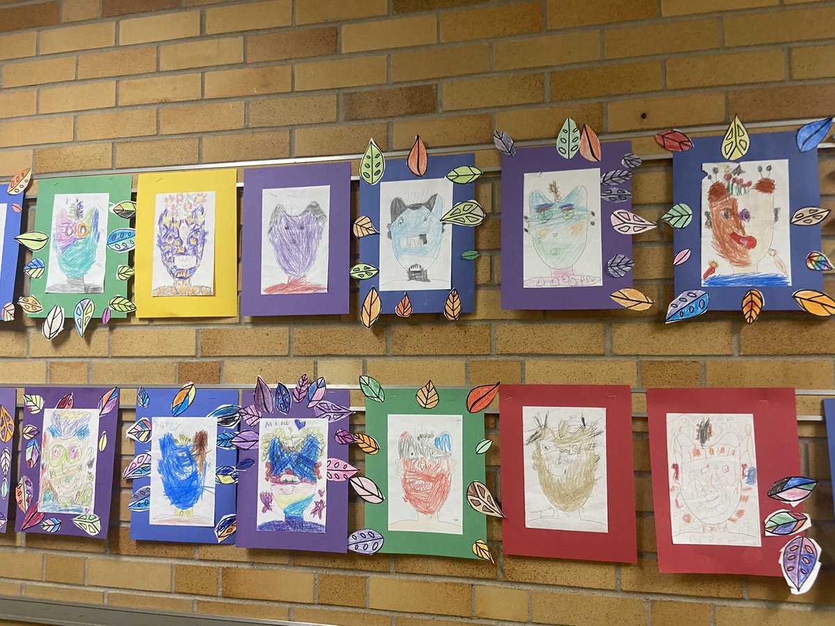 So sweet seeing kids point out their art projects to their families on conference night!