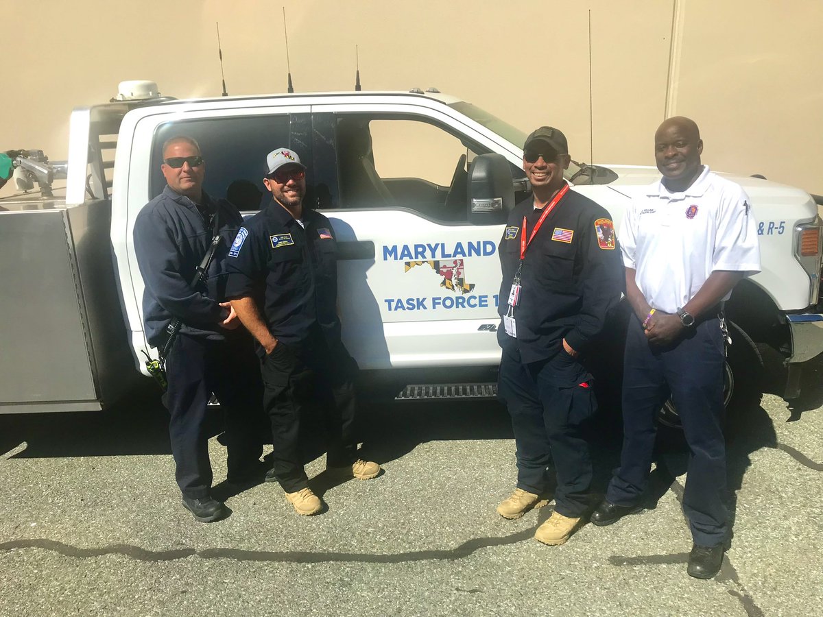 PGFDNews's tweet photo. #PGFD Battalion Chief Rollins &amp; Captain Bridgette welcome Lieutenants Ianiero &amp; Verdadero home from their Maryland Task Force 1 deployment to Florida to assist with Hurricane Ian response. #ServiceIsTheMission #PrinceGeorgesProud https://t.co/rUMEcgbZ8X