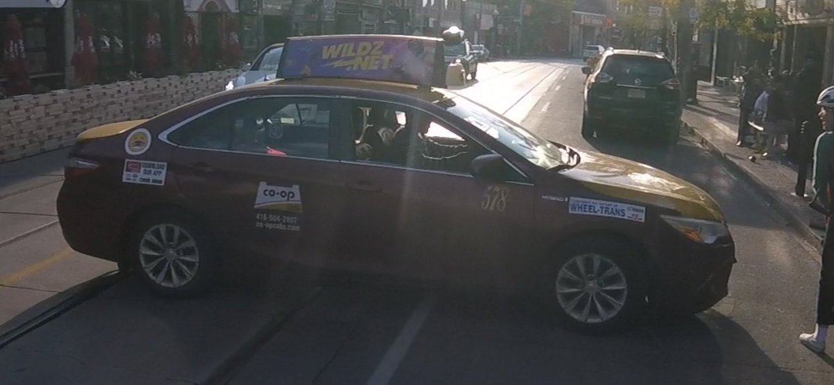 Clintech's tweet photo. Hey @coopcabs , please educate your drivers. At 5:15 tonight in front of 608 College St, cab 578 almost took out a cyclist, then yelled “If you’re taking the bike, you guys should watch”, as if he were not to blame. Reported to @TPSOperations #VisionZero #bikeTO #torontodriving https://t.co/OUkzxYu3mQ