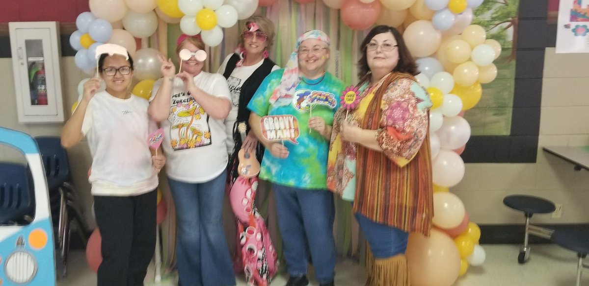 seventhwardelem's tweet photo. Another groovy day in the cafe! Mrs. Cox stopped by to visit, and our National School Lunch Week costume contest winner is Mrs. Cindy Abed! 🌼 https://t.co/KQrJZpmvb2
