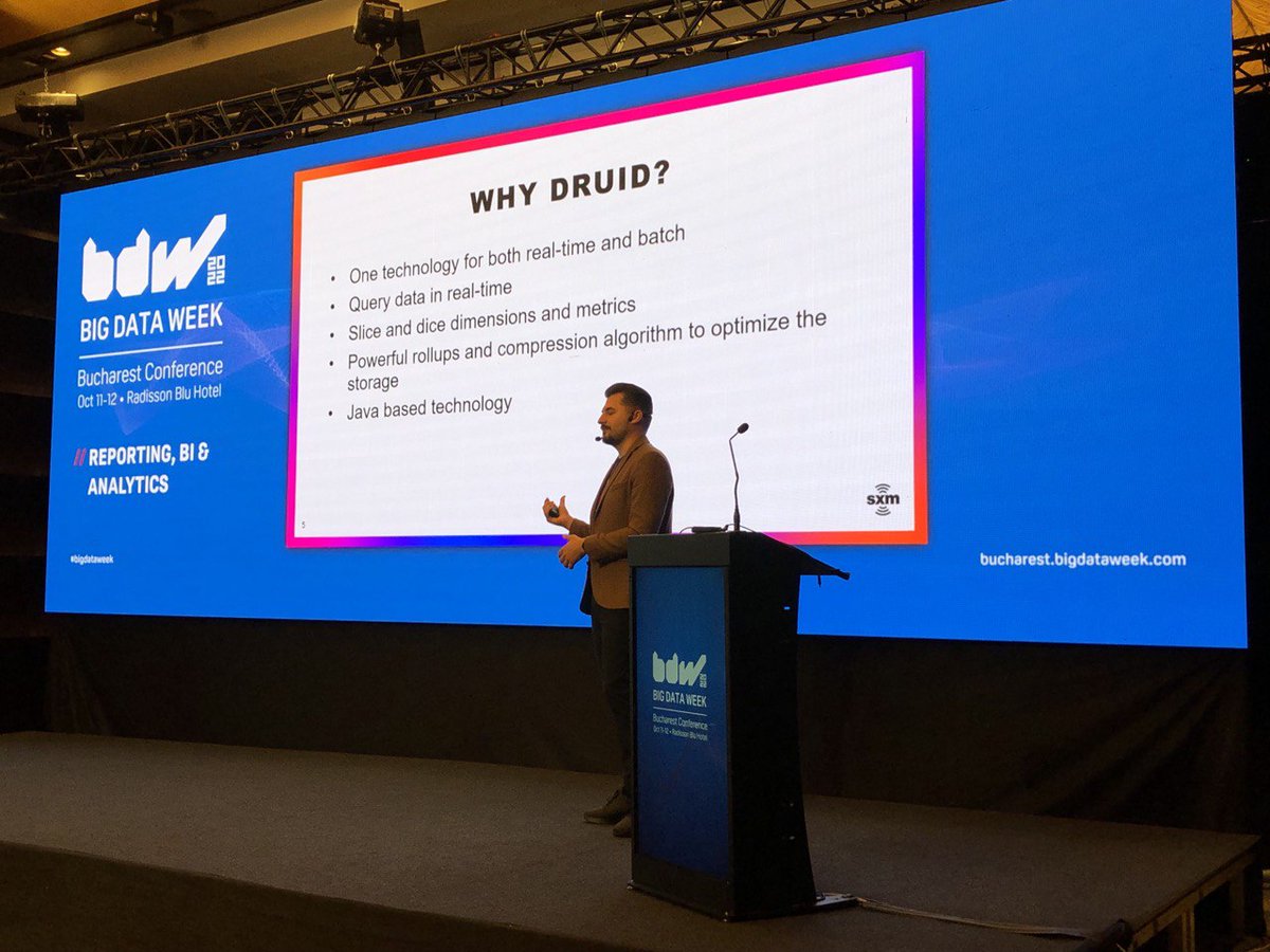 bigdataweek's tweet photo. Telling us the the journey of the @adswizz Analytics system managing 750 TB of data on the @druidio cluster, providing trade-offs around cost efficiency and high availability, is Artiom Darie, Head of Data Analytics & Senior Director!
#BigDataWeekBucharest #AdsWizz #ApacheDruid https://t.co/ByIsChysO4