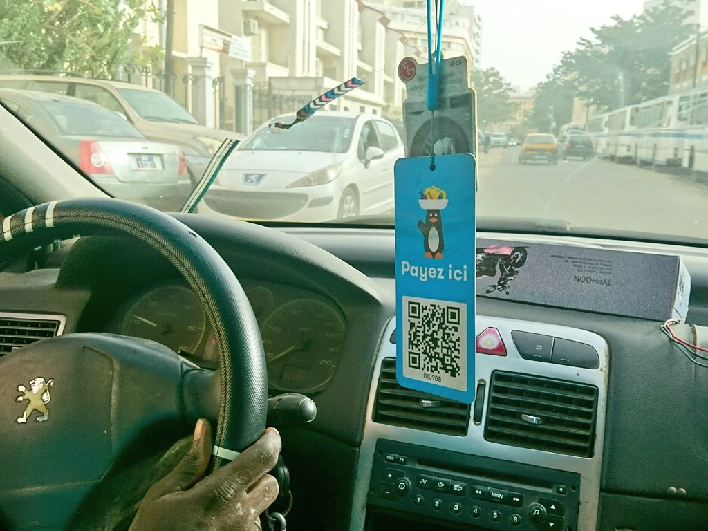 martinrlabbe's tweet photo. Révolution #fintech à Dakar :  les taxis acceptent désormais le paiement mobile avec @WaveSenegal. https://t.co/uiU6vdn3ke