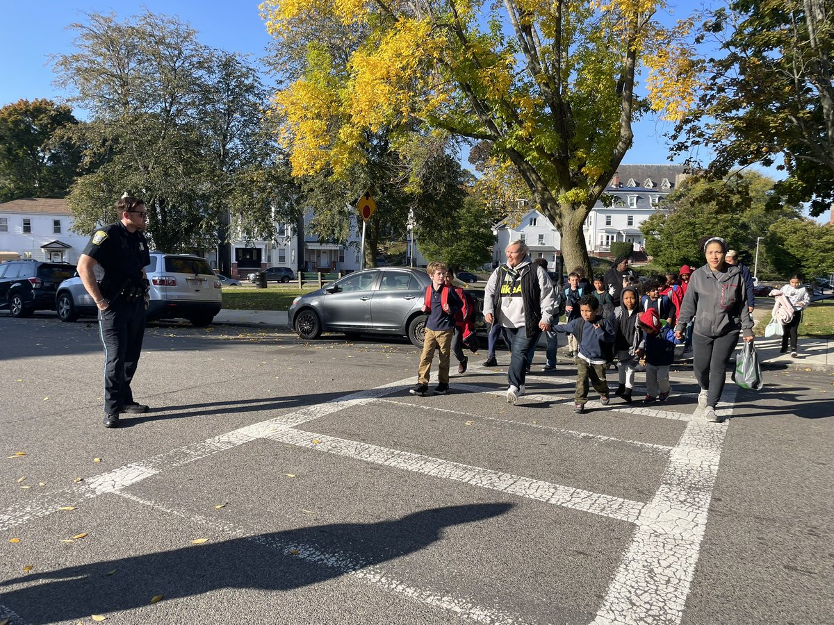 BostonBTD's tweet photo. Ms. Marshall and @bostonpolice assist the kids from the @MatherSchool in having a safe walk to school daily but today on International Walk, Bike, Roll to school day we recognize and celebrate all. Thank you for keeping our kids safe! #iwalked2022 #MASRTS @SafeRoutes_MA https://t.co/d7MIhBaN6A