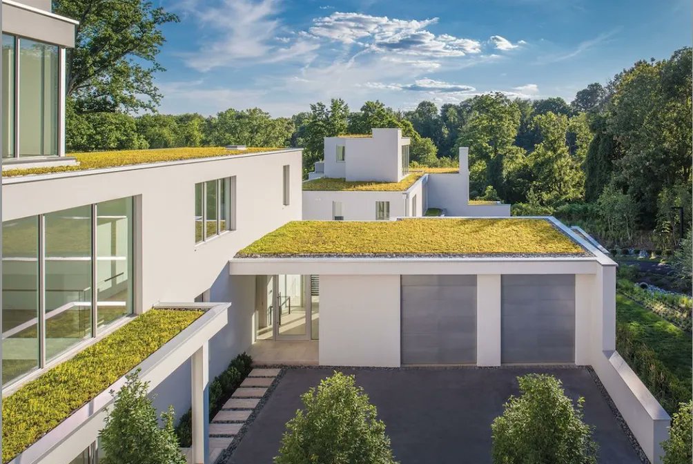 Thanks to @homeanddesigndc for featuring this modern home in DC's Battery Kemble Park.  We worked w @wouterboerarchitects &amp; @zantzingerbuilt to provide #greenroof expertise in meeting NPS stormwater requirements. Result feels like a continuation of the park across the entire roof