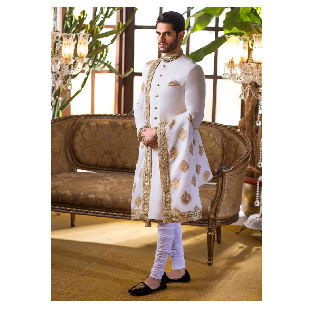 MohtaramCo's tweet photo. Stand out in this white and gold sherwani, hand embellished with dabka, kora &amp; resham embroidery for a regal look.

https://t.co/ATIODPqkjF

#Mohtaram #pakistanigroom #pakistanifashion #wedding #sherwani #pakistan #lahore #ceremonial #jacket #waistcoat #traditional https://t.co/JC5KEX1I6u