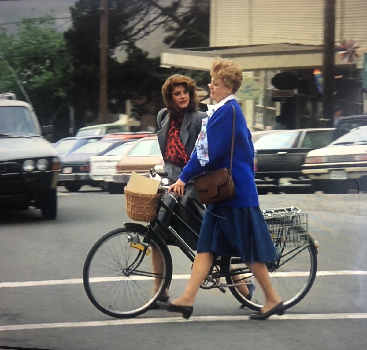 getrealandgood's tweet image. Angela Lansbury, the OG doing-it-in-heels bicycle commuter. A legend 💔