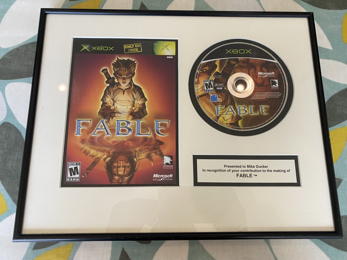 mike_ducker's tweet photo. The plaque I was given for making Fable has been missing presumed stolen since 2010. It ended up in a recycling centre auction in Northampton around 2014, then sat in a collection until it went on sale on eBay  recently, where a game dev I'd never met saw it and told me. 1/2 https://t.co/iKFbWTP1WS