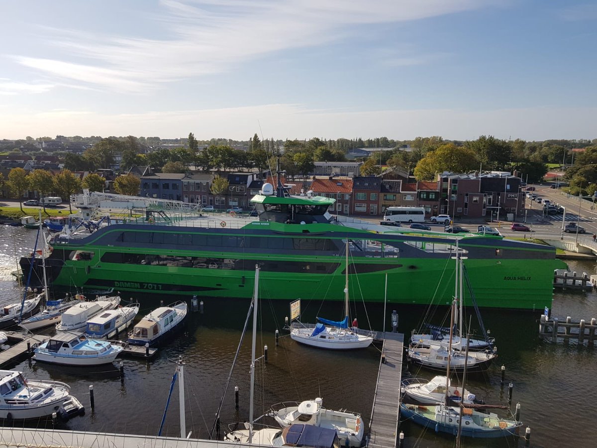 An astonishing view from my office at ⁦<a href="/portofdenhelder/">Port of Den Helder</a>⁩. Aqua Helix passing through our inner port, with destination ⁦<a href="/damenshipyards/">damenshipyards</a>⁩ #DenHelder