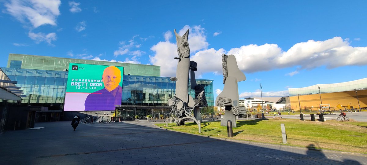 Boosey_Hannah's tweet photo. @brettdeanmusic adorning the front of @Musiikkitalo in the glorious Helsinki autumn sunshine ahead of the opening of his music focus with @Yle_Rso @nicholascollon this evening 🎶 https://t.co/shiJmz9JBJ