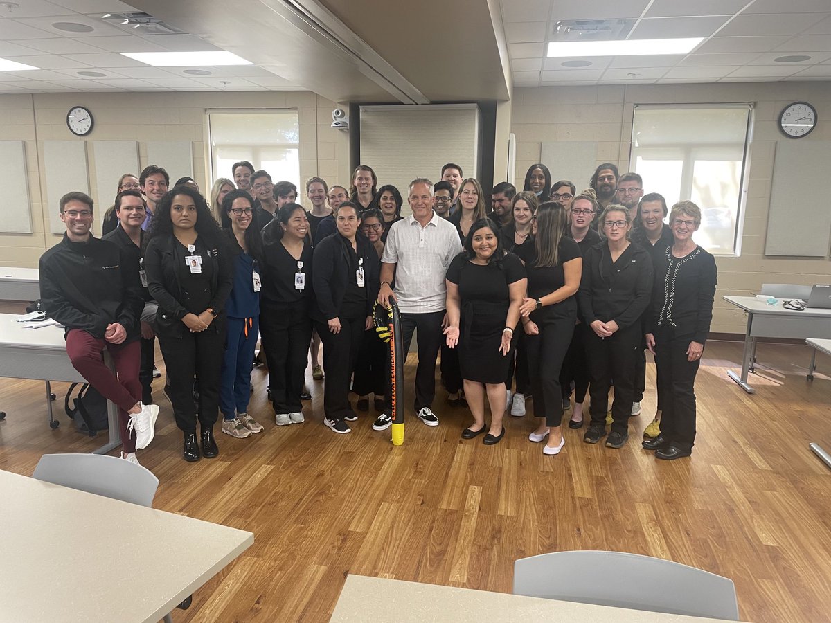 doctorvec's tweet photo. Today is my 50th bday. My residents all dressed in black to signify the death of my youth. https://t.co/ymKS2kVQMP