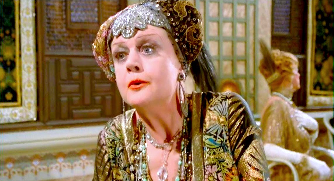 One of my favorite Angela Lansbury performances is from 1978’s Death on the Nile. She plays the consistently drunk and perpetually horny romance author Salome Otterbourne. In a movie packed with high-wattage star power, she absolutely steals every scene she’s in.