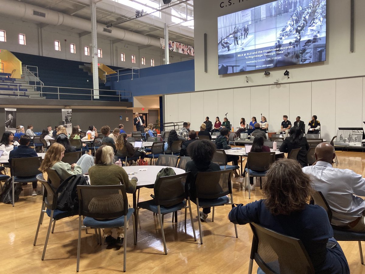 BryanSokol's tweet photo. The Room Where It Happened! MLK@SLU’64 @SLUPresident Dr Pestello introduces MLK Scholars as they recite the speech delivered in the auditorium by Rev Dr Martin Luther King Jr in October 1964. 58 yrs ago! #OccupySLU @SLU_Official @SLU_CSA @CCCslu https://t.co/XA0if5Pa18