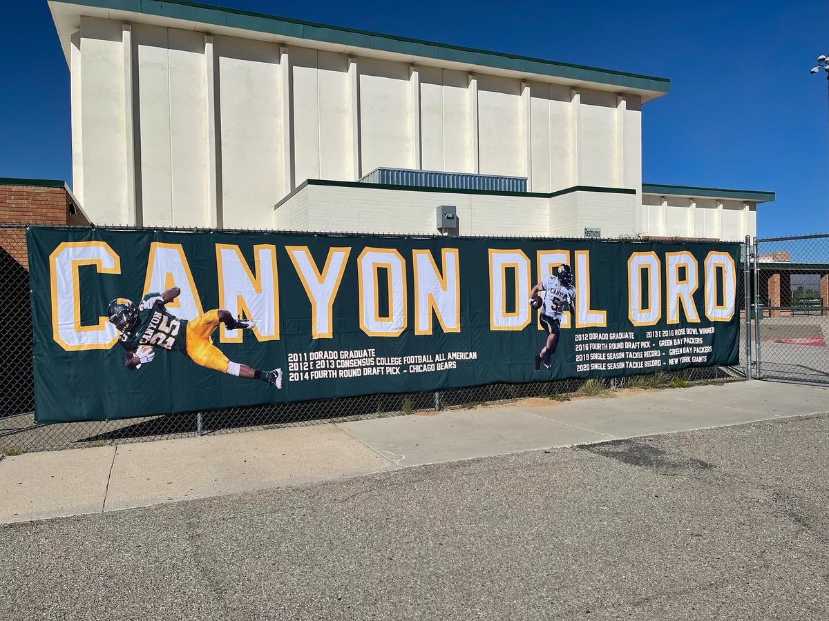 JavierJMorales's tweet photo. Banners entering Dorado Stadium at CDO. Ka’Deem Carey and Blake Martinez major part of the 27-1 record in Dustin Peace’s first two years with a title in 2009 with @cdo_football. https://t.co/VgIdV1uLoQ
