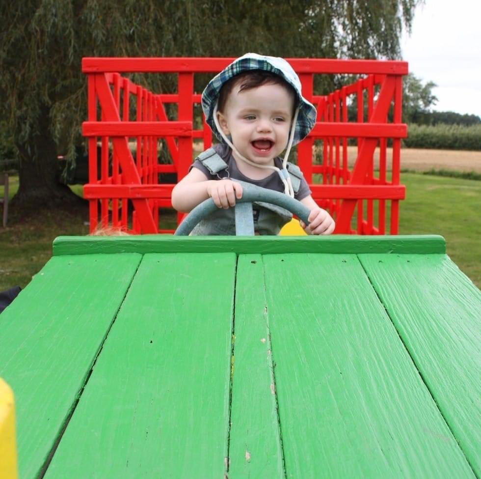 WordWoman4U's tweet photo. Not even a year old and he’s behind the wheel. https://t.co/RdFgsmytuB