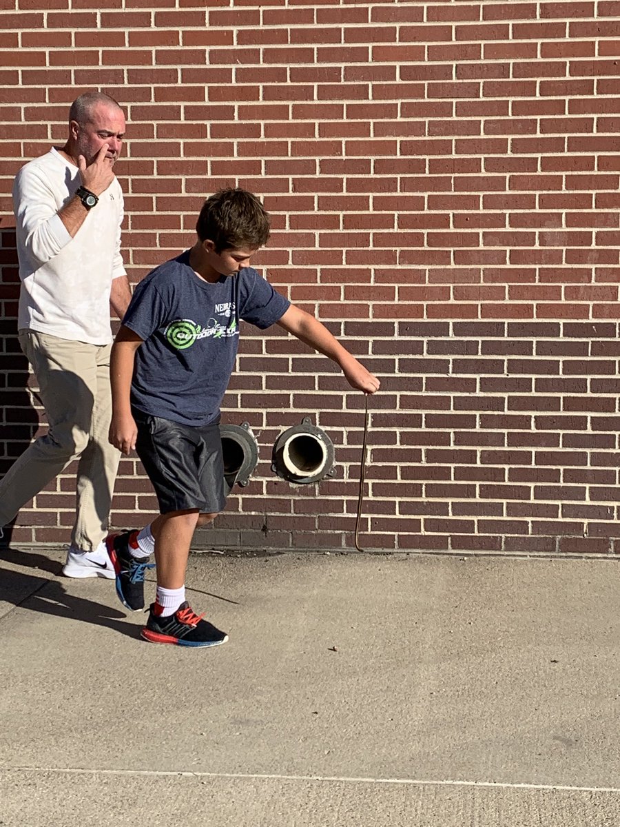 CaitlinDebower's tweet photo. Lots of excitement at recess today! 🐍@mrscrystalbell  and I forgot our snake wrangling abilities at home today so we had to call in reinforcements! Thanks @BentzDon! #lakeviewvikes https://t.co/Iq5wZ1pWko