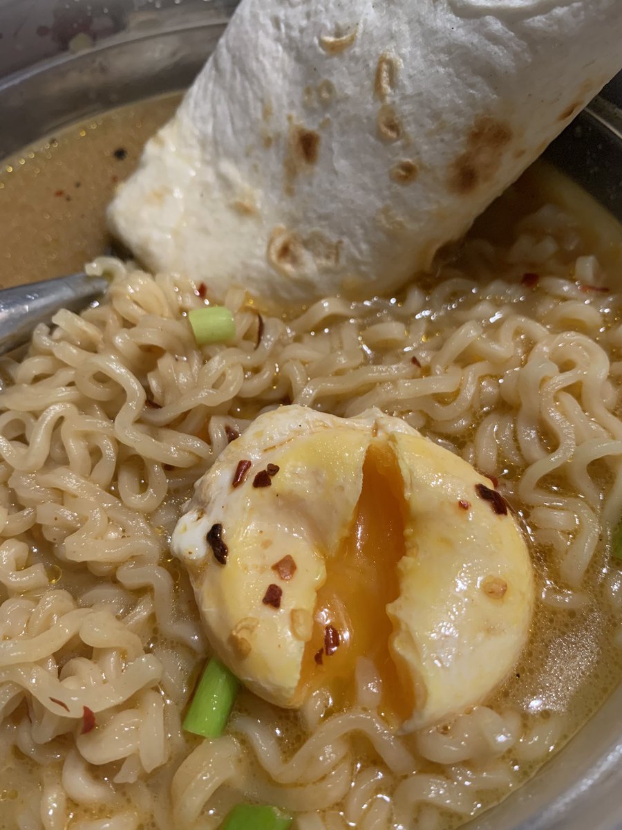I wanted something quick for lunch but plain ramen wouldn’t do! A poached egg yolk, some green onion, hot pepper flakes, presses garlic and hot sauce mixed in with tortillas to dip. Yum!