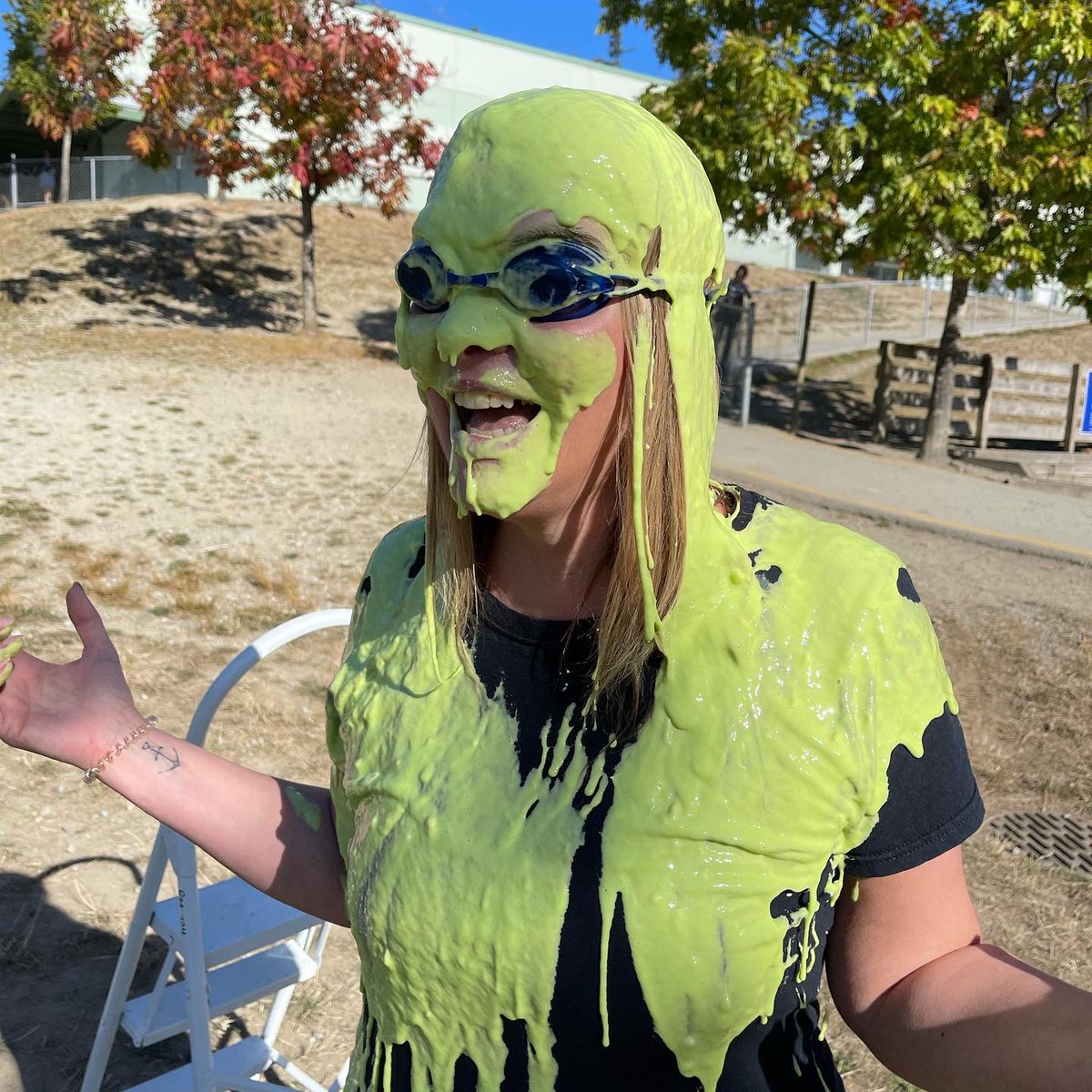 JanineClose's tweet photo. Taking on “kid created” dares for every $4000 raised for Terry Fox and cancer research resulted in me getting “slimed” by Constable Dixon today!  #CancerResearch #TerryFox #sd43 #Aspenwood https://t.co/PHHsbyd3Gh